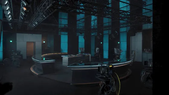 Sean Combs defamation suit against NBCUniversal: an empty television news studio with the lights down
