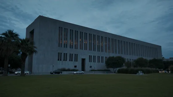 LA County $4 billion juvenile hall settlement: a government building at blue hour