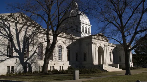 Nevada Roblox settlement: a domed state capitol framed by bare trees