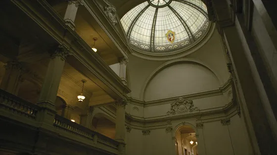 Indiana and Texas lawsuits against Discord and Roblox: a statehouse rotunda under a stained glass dome